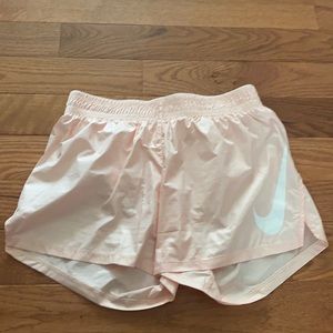 Light pink Nike running shorts. Size extra small